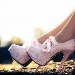 Close up of a pink high heels with diamons